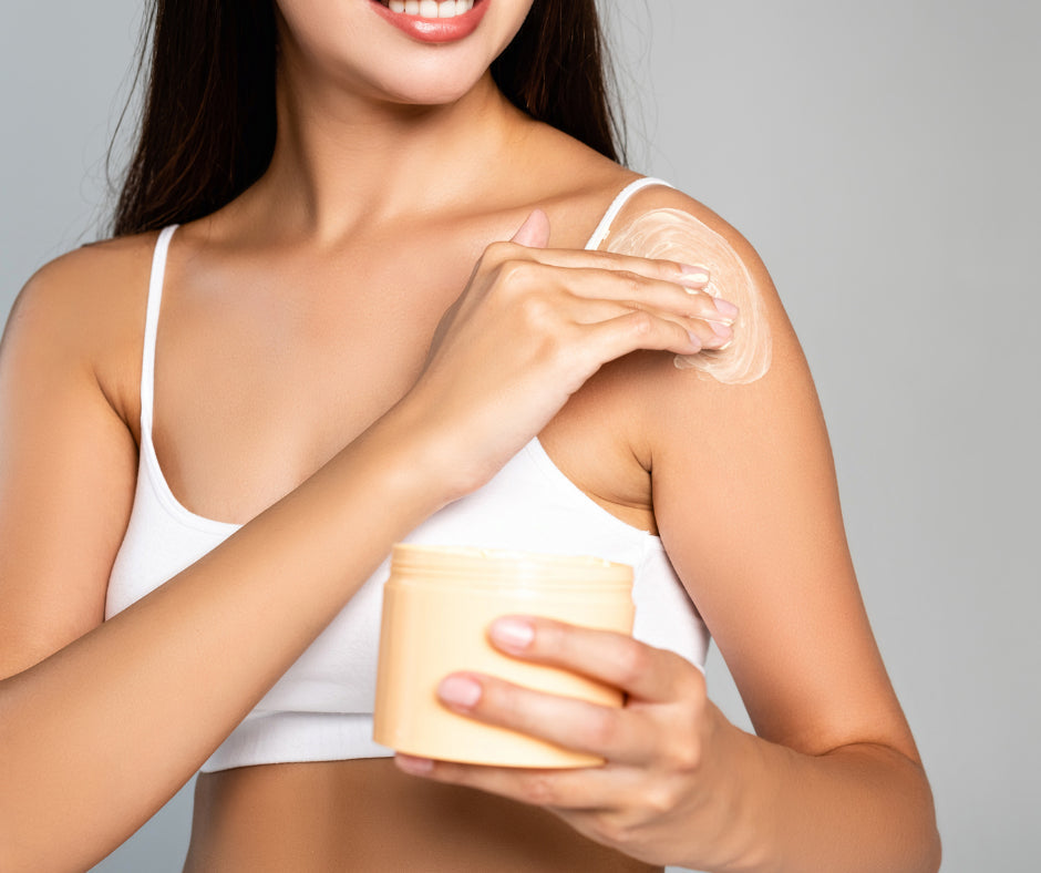 Woman applying skin care while the body regulates temperature