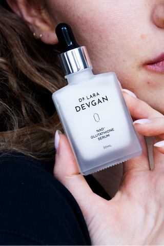 Dr. Lara Devgan NAD+ Glutathione Serum, shown in use