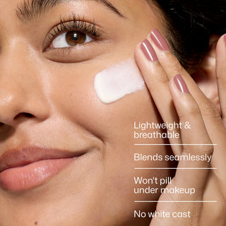 Model blending EltaMD UV Clear Broad Spectrum SPF 46 onto the cheek