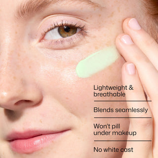 Model blending green tinted EltaMD UV Skin Recovery Broad Spectrum SPF 50 into her cheek
