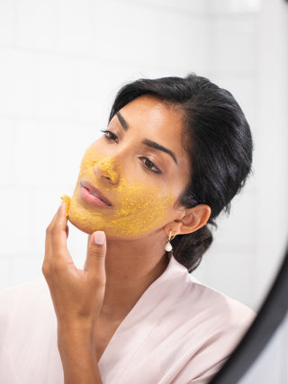 Eminence Turmeric Energizing Treatment, shown in use, second view