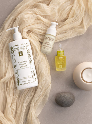 Eminence Clear Skin Probiotic Cleanser, shown in use during a cleansing routine