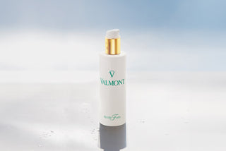 Valmont Fluid Falls bottle with its outer packaging