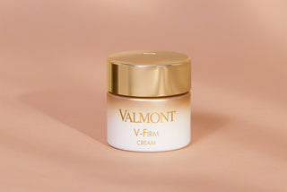 Valmont V-Firm Cream jar with its outer packaging