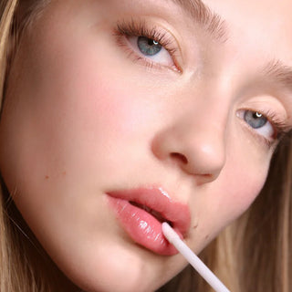 Applying Dr. Lara Devgan Platinum Lip Plump
