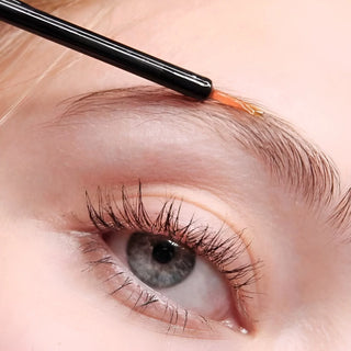 Applying Dr. Lara Devgan Platinum Long Lash serum