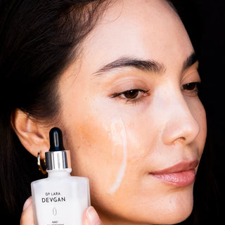 Model with Dr. Lara Devgan NAD+ Glutathione Serum
