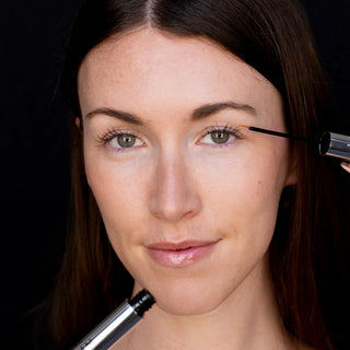Model applying Dr. Lara Devgan Platinum Long Lash