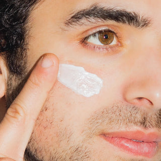 Dr. Lara Devgan Advanced Vitamin B+E Recovery Cream applied to the cheek