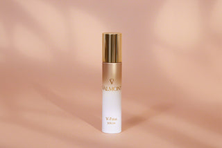 Valmont V-Firm Serum bottle with its outer packaging