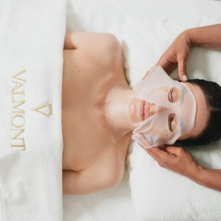 Valmont regenerating mask being applied during a spa treatment